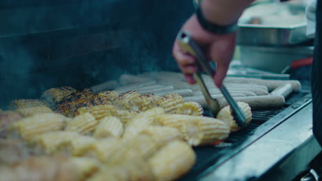grilling corn on the cob and sausages