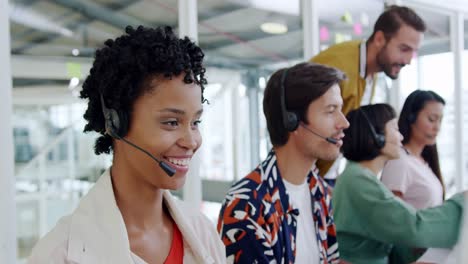 Call-centre-staff-working-in-a-modern-office