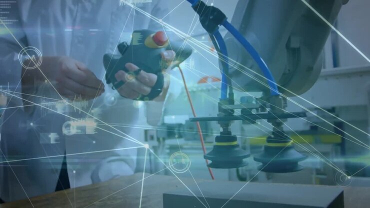 Animation of network of connections over hands of caucasian man working in computer laboratory