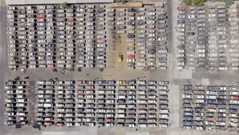 Overhead-View-Of-People-Looking-For-Used-Cars