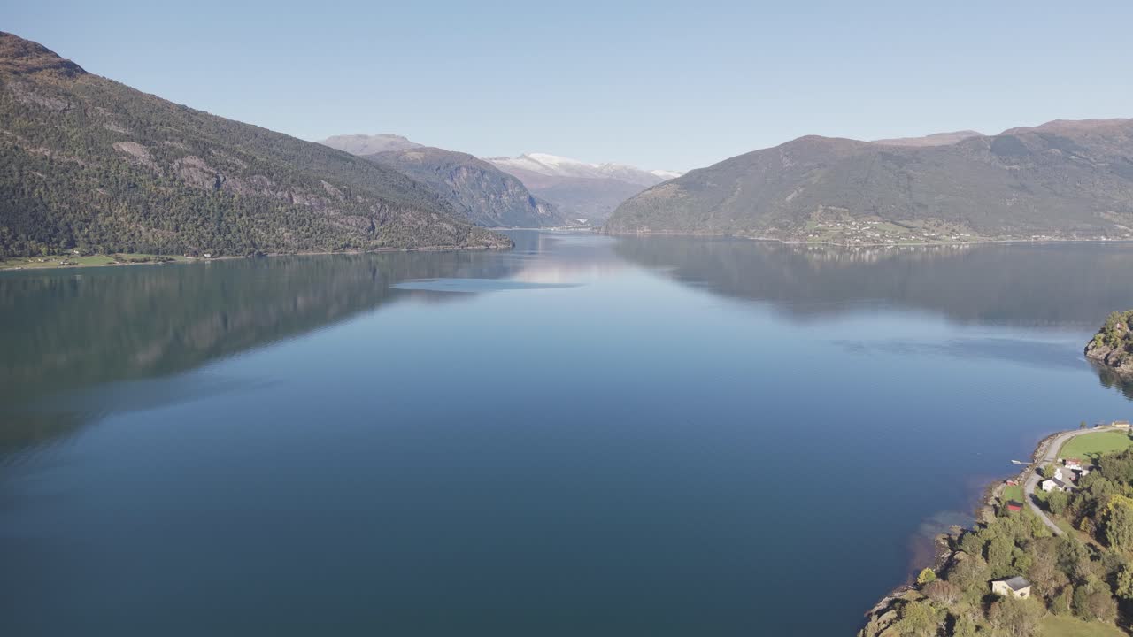 Drone footage of Lusterfjorden fjord in and Folgefonna National Park in a far