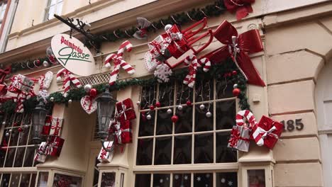 festive packages and presents in front of a street restaurant in heidelberg, germany at a festive christmas market in europe