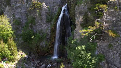 Beautiful-waterfall-of-Grunasi-in-Albania-visited-by-tourists-in-spring-after-snow-melts-on-mountains