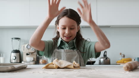 girl playing with dough