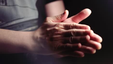 close-up of clasped hands