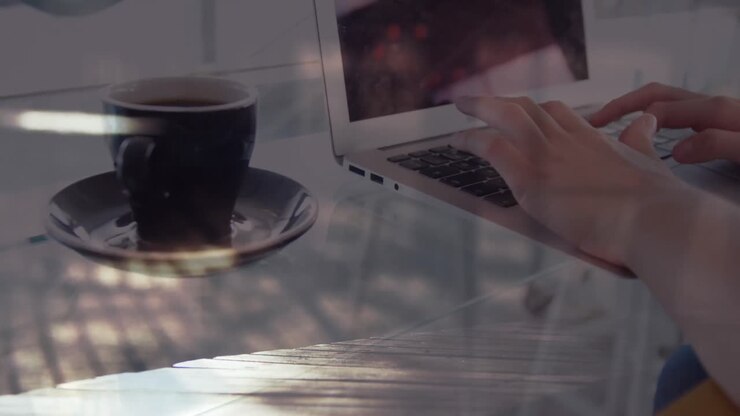 Animation of hands of woman with coffee using laptop, over sped up commuters walking in city