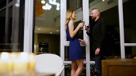 couple interacting with each other while having wine 4k