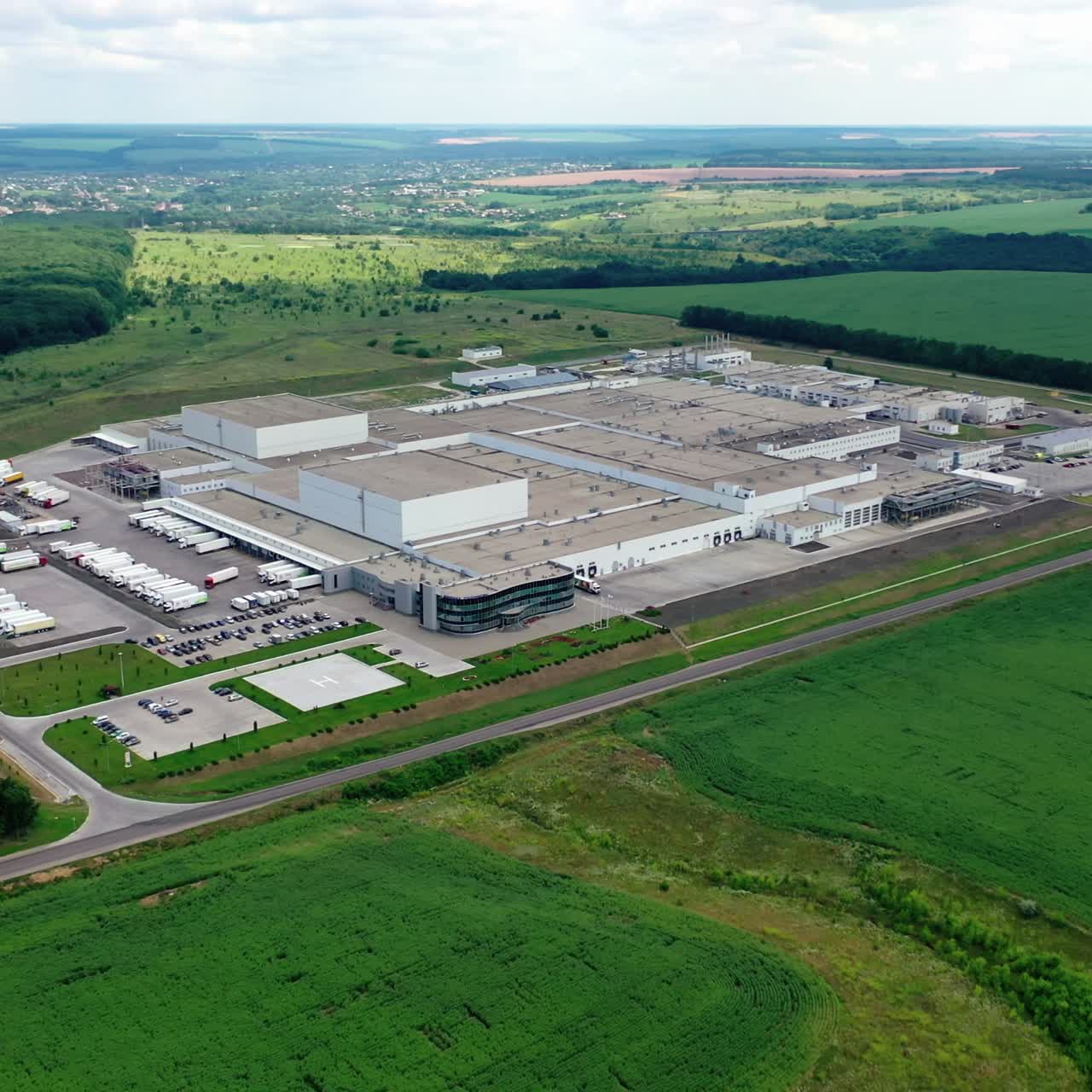 Aerial view of a large modern industrial factory. Industrial background. Logistics from above