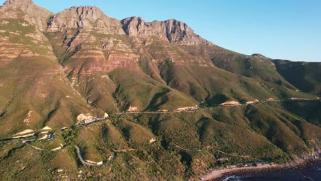 beautiful sunset of chapmans peak drive during summer in cape town, aerial