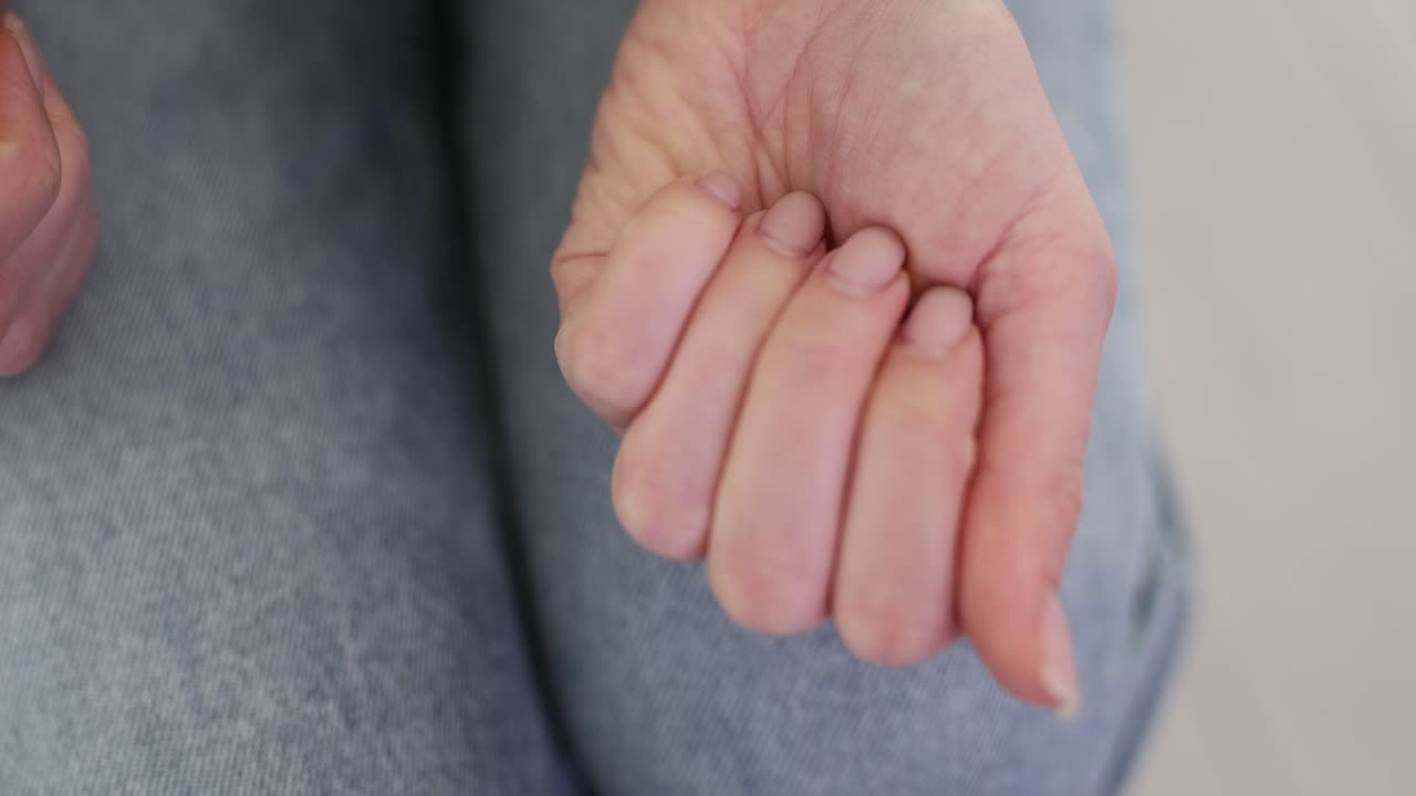 Heart shaped pills in hand