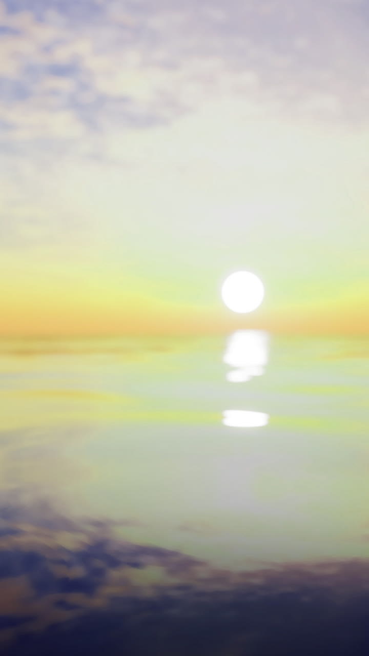 Golden sunrise over calm ocean waters creates serene atmosphere