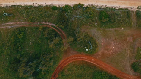 fly over a beach with a bird eye view