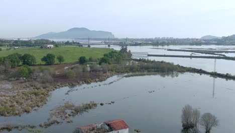 Drone-flyover-natural-landscape-of-Santona-wetlands-in-Cantabria,-Spain