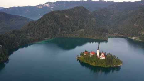 beautiful landscape view of lake bled, slovenia - aerial view of pilgrimage church of the assumption of maria above lake bled