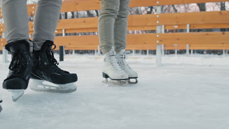 people ice skating on a winter day