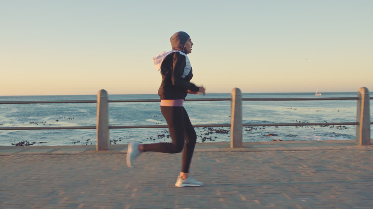 Exercise, fitness and woman running by ocean