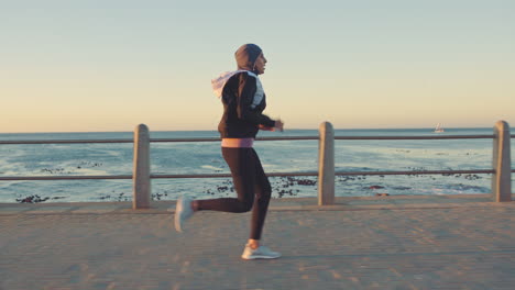 Exercise,-fitness-and-woman-running-by-ocean