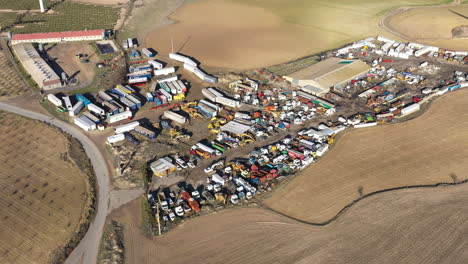 junkyard aerial shot lots of old trucks spain abandoned wrecked cars