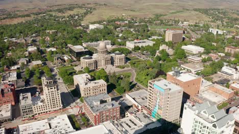 wide establishing aerial shot of boise's downtown district featuring the idaho state capitol building