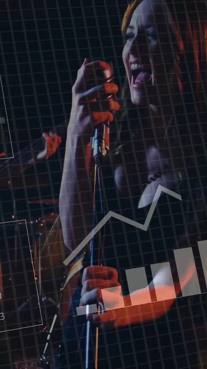 Vertical video: Opening close-up hands gripping mic, vocalist singing, HUD charts visualizing data