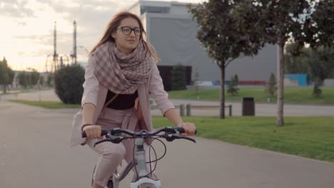 woman cycling in a park