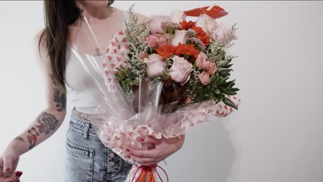 a florist modeling her bouquet