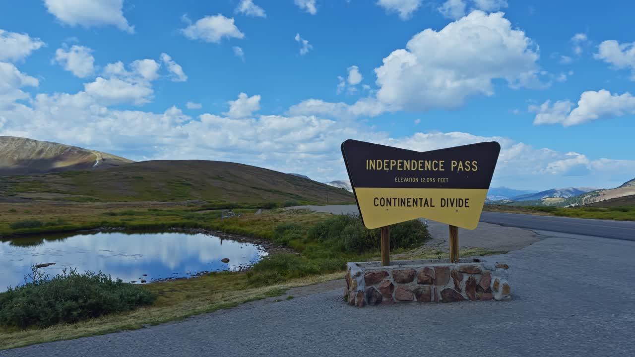 Wide panning shot from Independence Pass highlighting the Continental Divide and dramatic Rocky Mountain terrain
