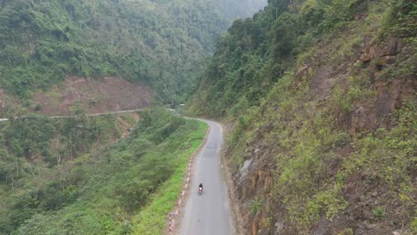 motorbike ride through a mountain valley