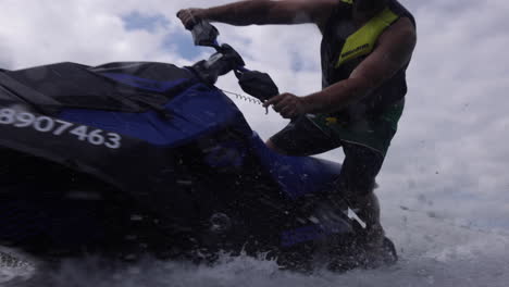 jet ski rider spinning away from camera extreme sports motorsport