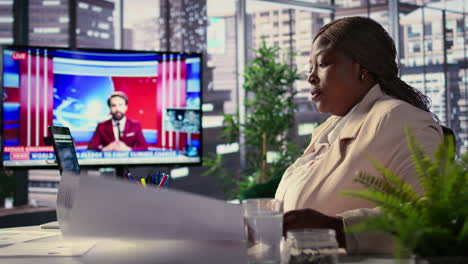 businesswoman reviewing architectural plans in a modern office