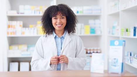 Happy-female-chemist-welcoming-customer-to