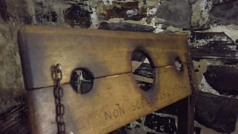 close up of ancient pillory in punishment chamber