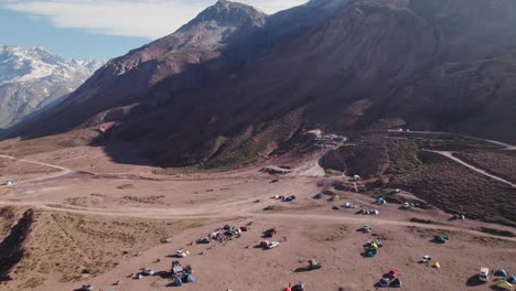 panoramic view of camping site near hot spring bath pools in termas valle de colina, chile