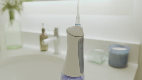 wide tilt down of a water flosser