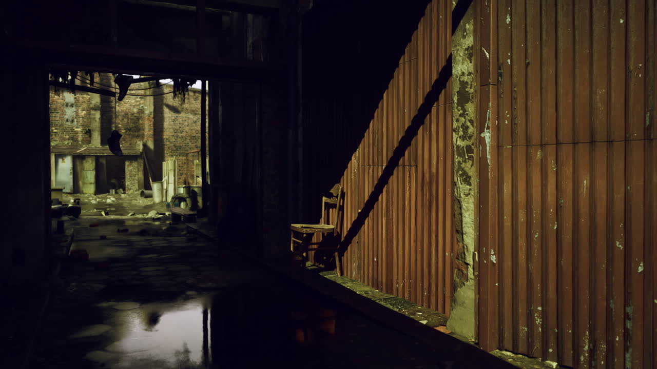 Abandoned warehouse interior with reflections highlighting the forgotten space