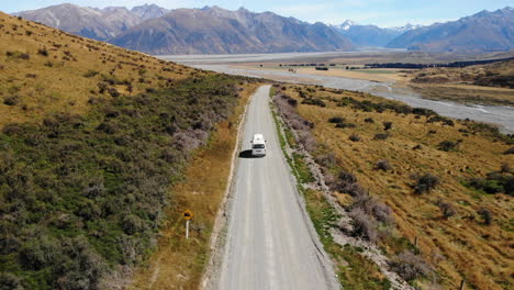 Travel-Van-life-New-Zealand-mountains-and-lake-Drone-following-4k