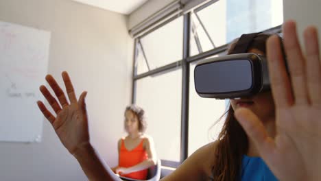 female executive using virtual reality headset 4k