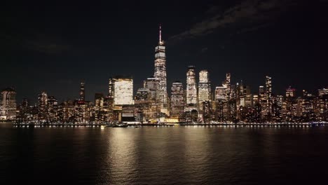 night skyline of new york skyline at manhattan in new york united states. night city landscape. financial district. new york skyline at new york united states. highrise buildings scenery.
