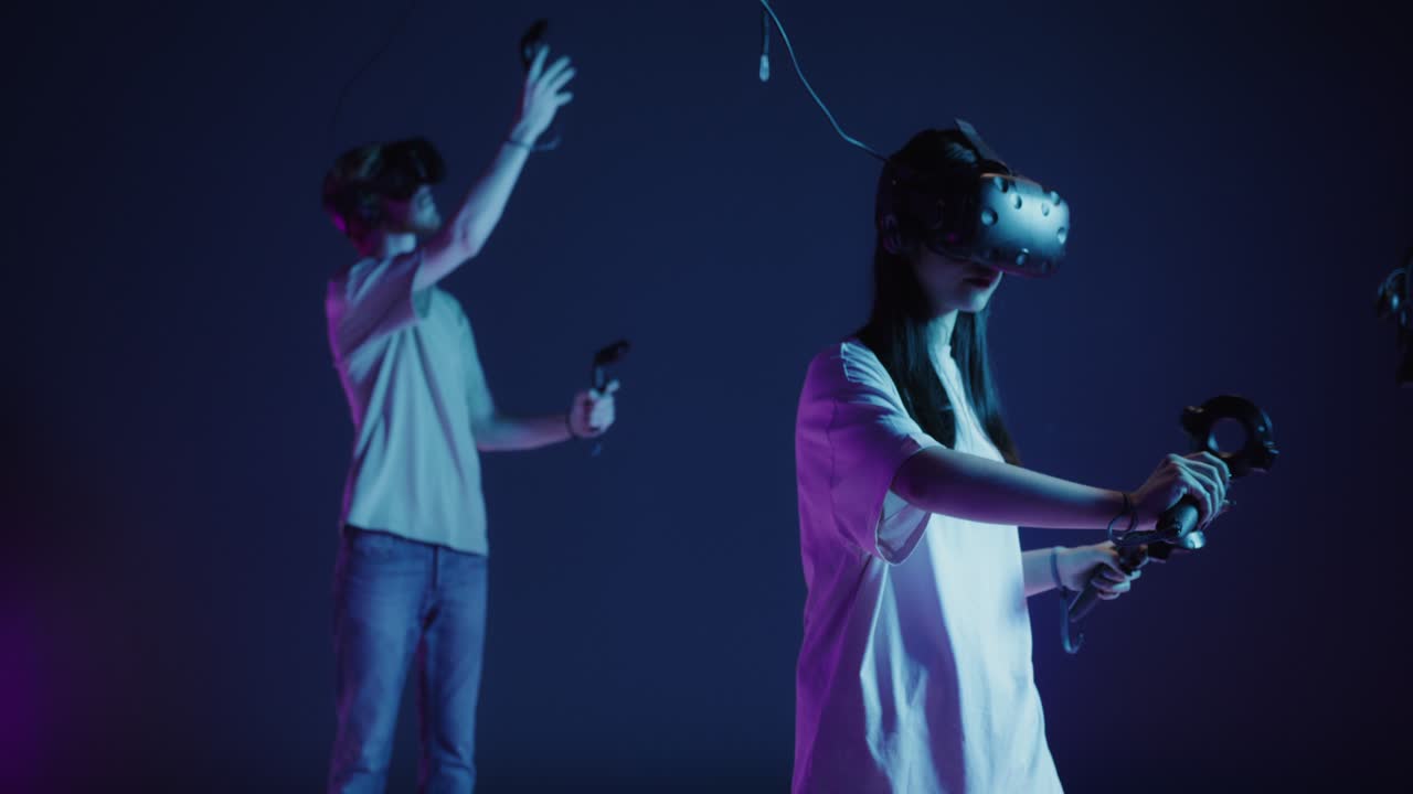Two People Experiencing Virtual Reality