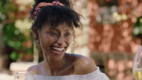 beautiful african american woman drinking wine making toast with friends celebrating on vacation at holiday villa group of people relaxing outdoors on sunny day 4k