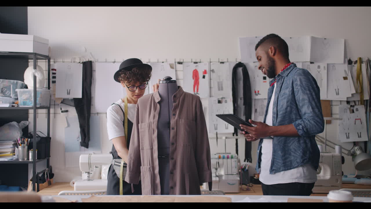 Fashion Designers Working on a Dress Design