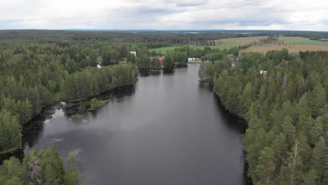 aerial view of lake nedre dammen in gammelstilla, gästrikland, sweden with the small island outside skoludden