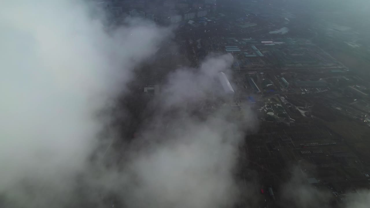 Aerial View of Industrial Area with Fog and Smoke
