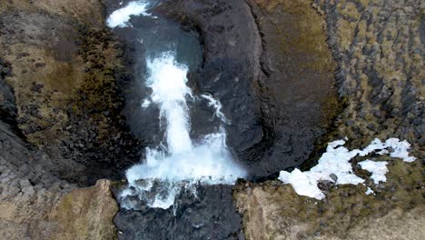 drone on top of waterfall in western iceland svodufoss waterfall snaefellsnes peninsula