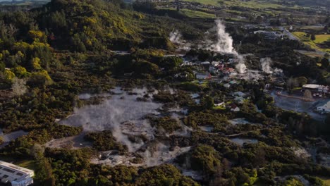 Aerial-view---beautiful-scenery-of-Te-Puia-Volcanic-Valley-reveal-New-Zealand-landscape-during-golden-hour