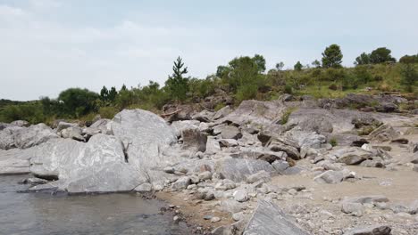 rocks stone water landscape, river flow sierras at calamuchita córdoba argentina