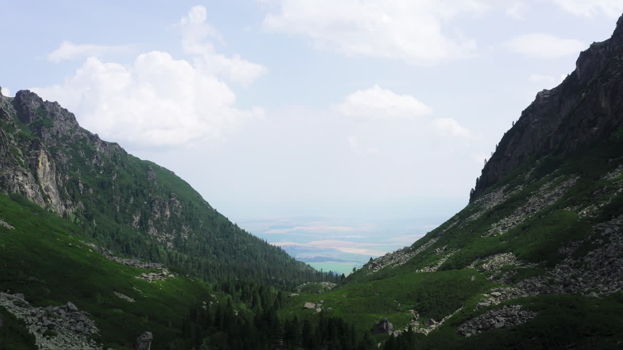 Scenic Mountain Valley Landscape with Green Slopes