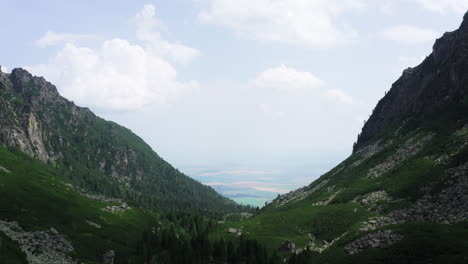 scenic mountain valley landscape with green slopes