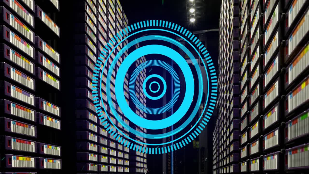 Animation of blue round scanner spinning against computer server room