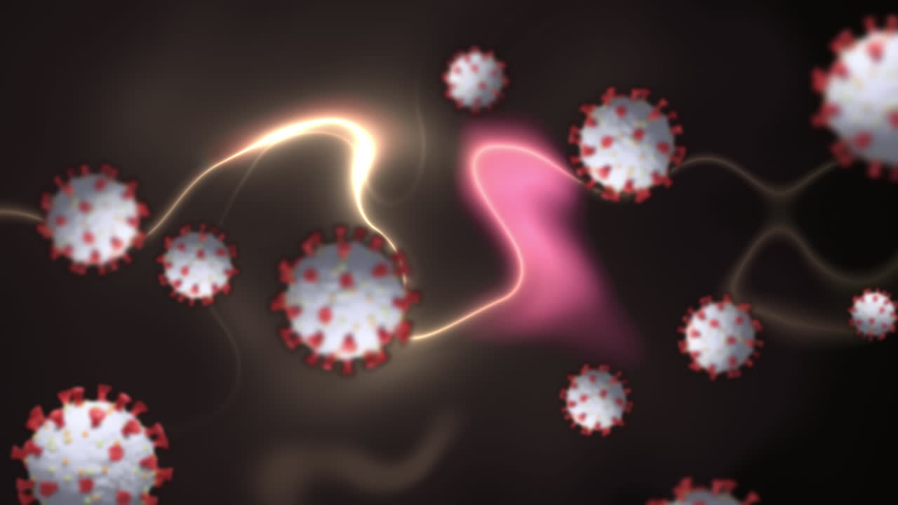백그라운드에서 파동하는 빛의 흔적 위에 떠다니는 여러 코로나19 세포의 애니메이션